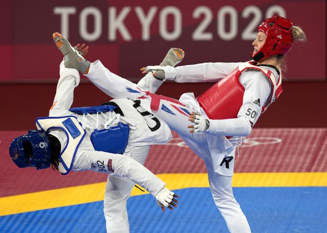 <p>Lauren Williams has booked her place in the Olympic taekwondo final (Martin Rickett/PA)</p>