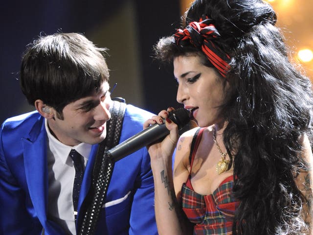 <p>Mark Ronson and Amy Winehouse perform at the Brit Awards in 2008</p>