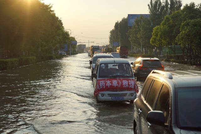 <p>Nearly 400 people died in the floods in Henan province in July 2021 </p>