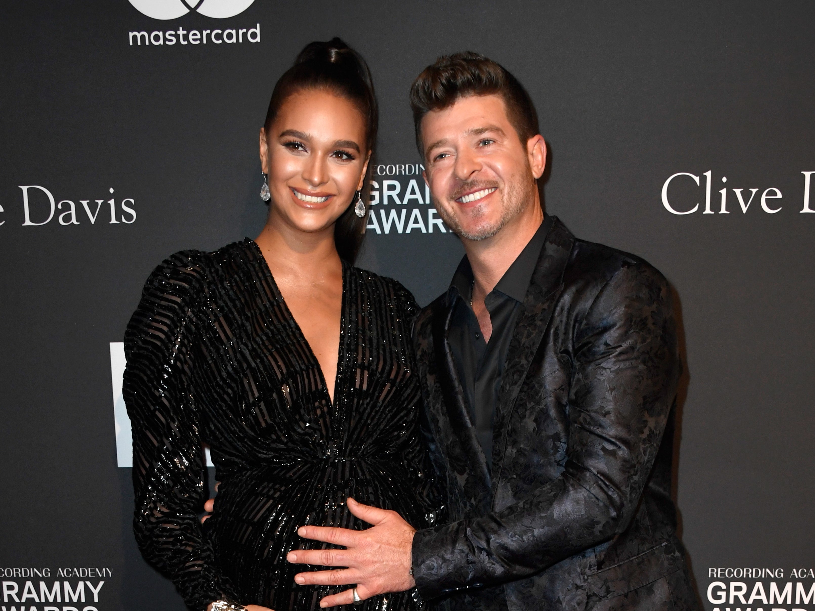 Robin Thicke and April Love Geary at the Pre-Grammy Gala in 2019