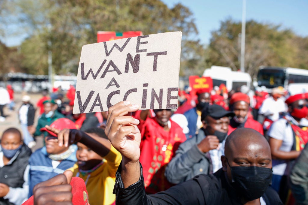 Protesters rally outside the South African health products regulator in Pretoria in June