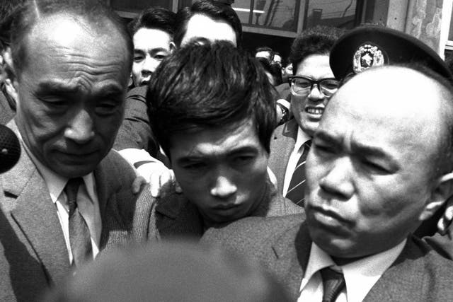 <p>Nagayama is arrested at Yoyogi Police station in Tokyo in 1969 </p>