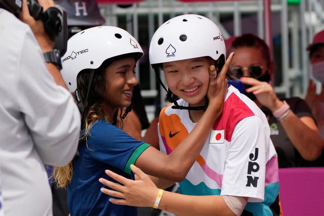 <p>Silver medallist Rayssa Leal of Brazil congratulates gold medal winner Momiji Nishiya of Japan after the women’s street skateboarding finals at the 2020 Olympics</p>