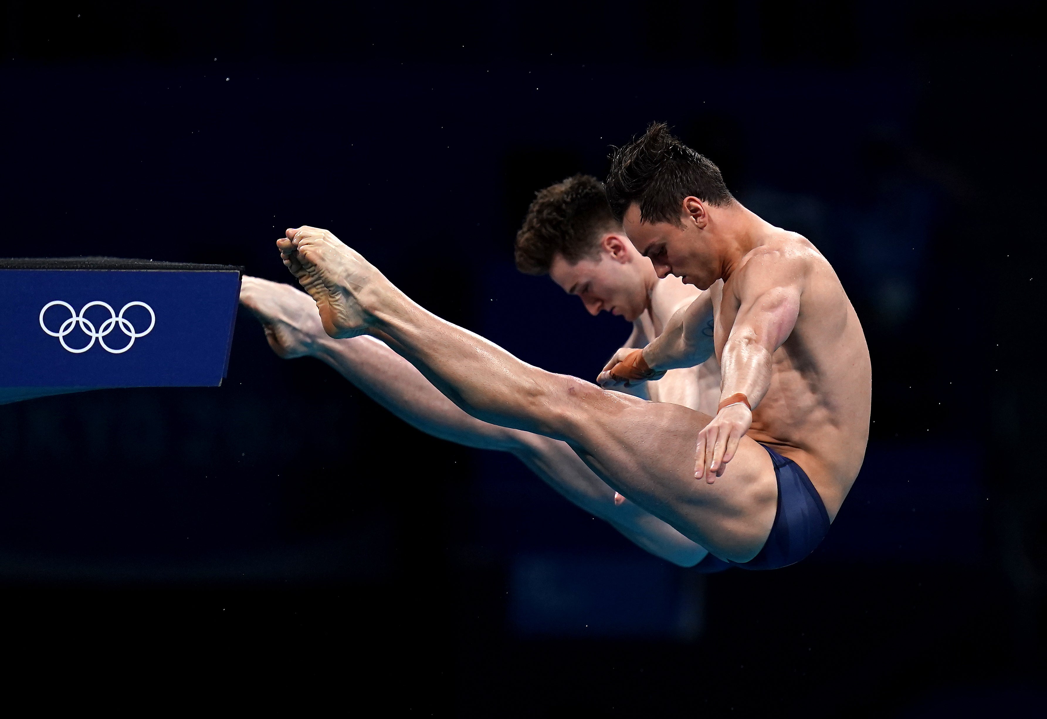 Tom Daley and Matty Lee in perfect sync on their way to gold in the 10 metre platform diving (Adam Davy/PA)