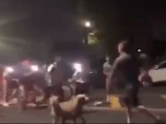 A group of teenagers confronts an off-duty New York firefighter who is out walking his dog in Queens. The teens allegedly attacked the firefighter before being scared off by an ambulance.
