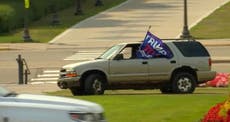 Woman waving Trump flag shouting she’s a white woman drives onto Minnesota state capitol mall