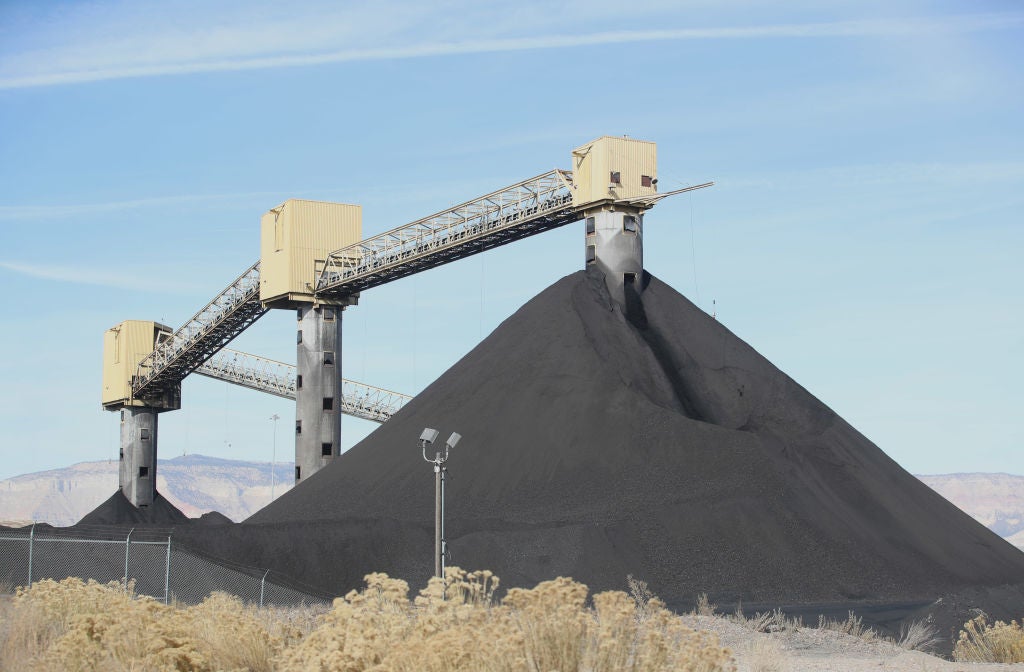 <p>Piles of coal wait to be burned at a coal-fired power plant outside of Castle Dale, Utah</p>