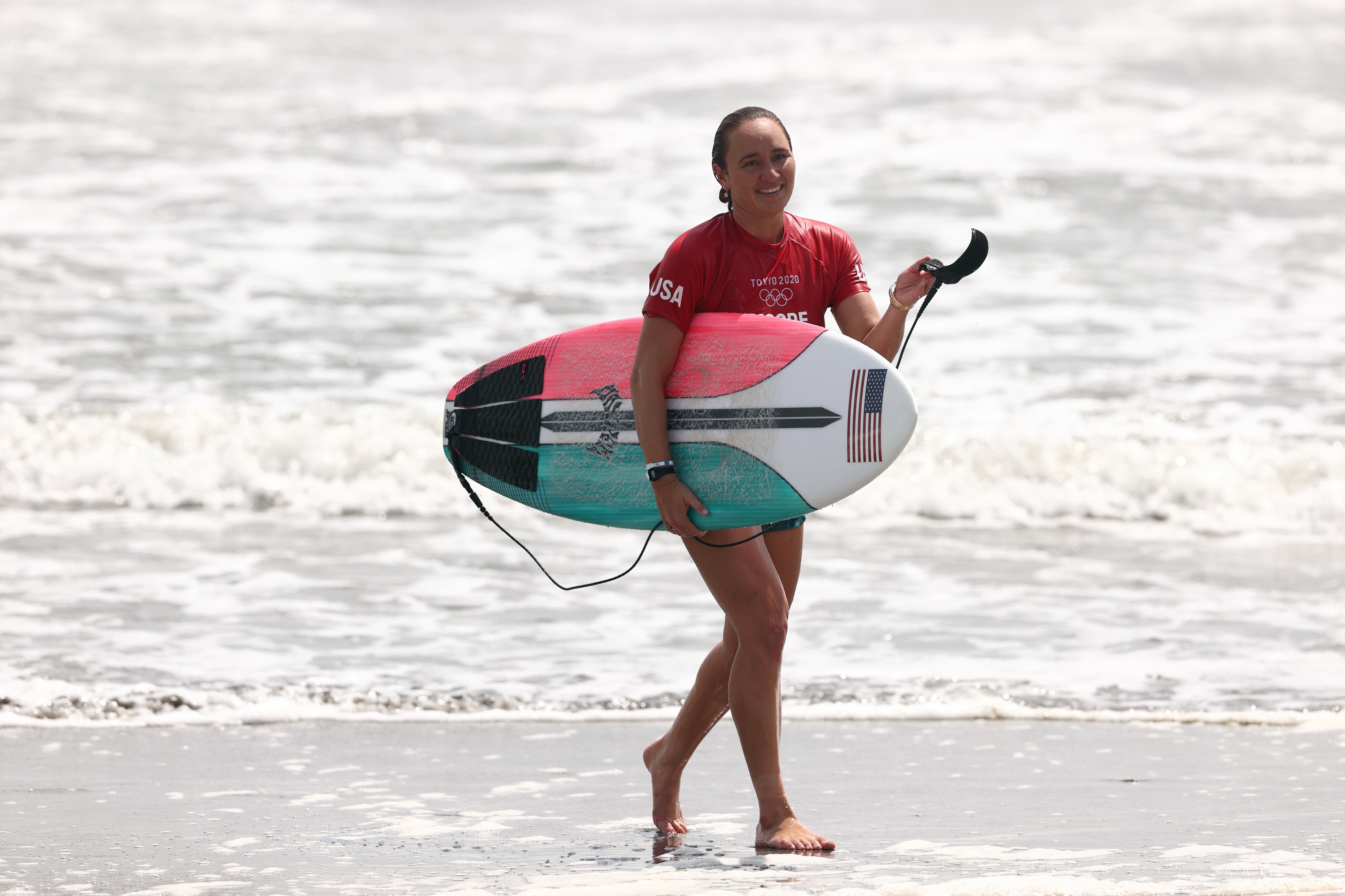 Carissa Moore of Team United States reacts after winning her Women's Round 3 heat on day three of the Tokyo 2020 Olympic Games at Tsurigasaki Surfing Beach on July 26, 2021 in Ichinomiya, Chiba, Japan.