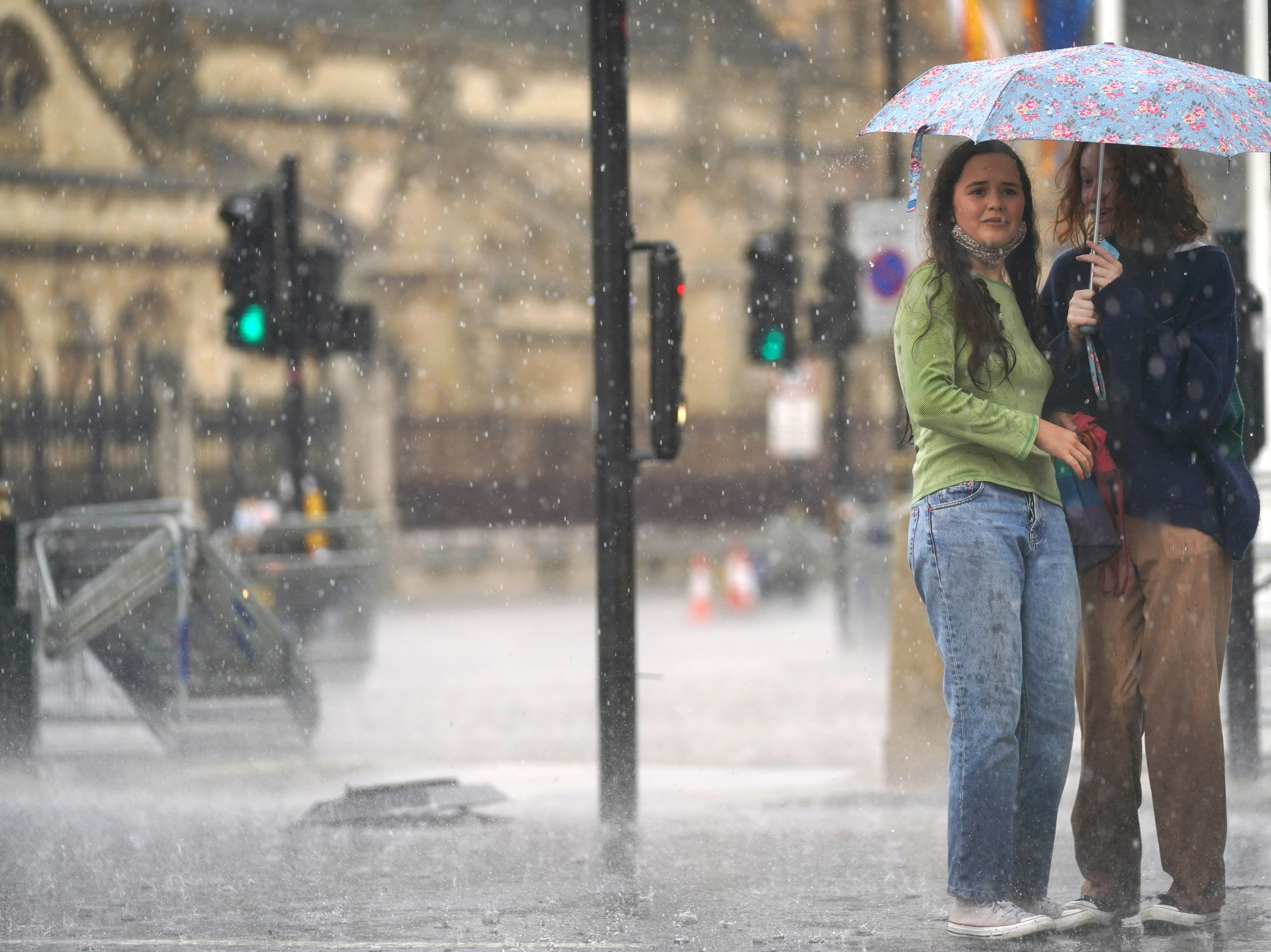 Torrential rain hammered London on Sunday, causing serious flooding in many places