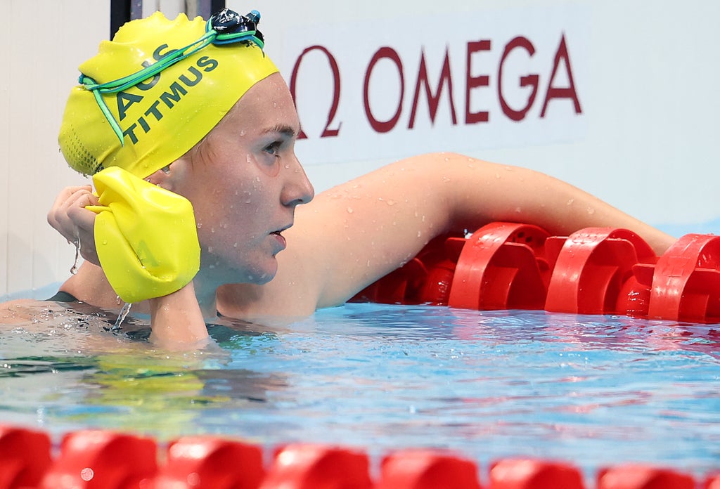 Olympics Why swimmers wear two caps in the pool