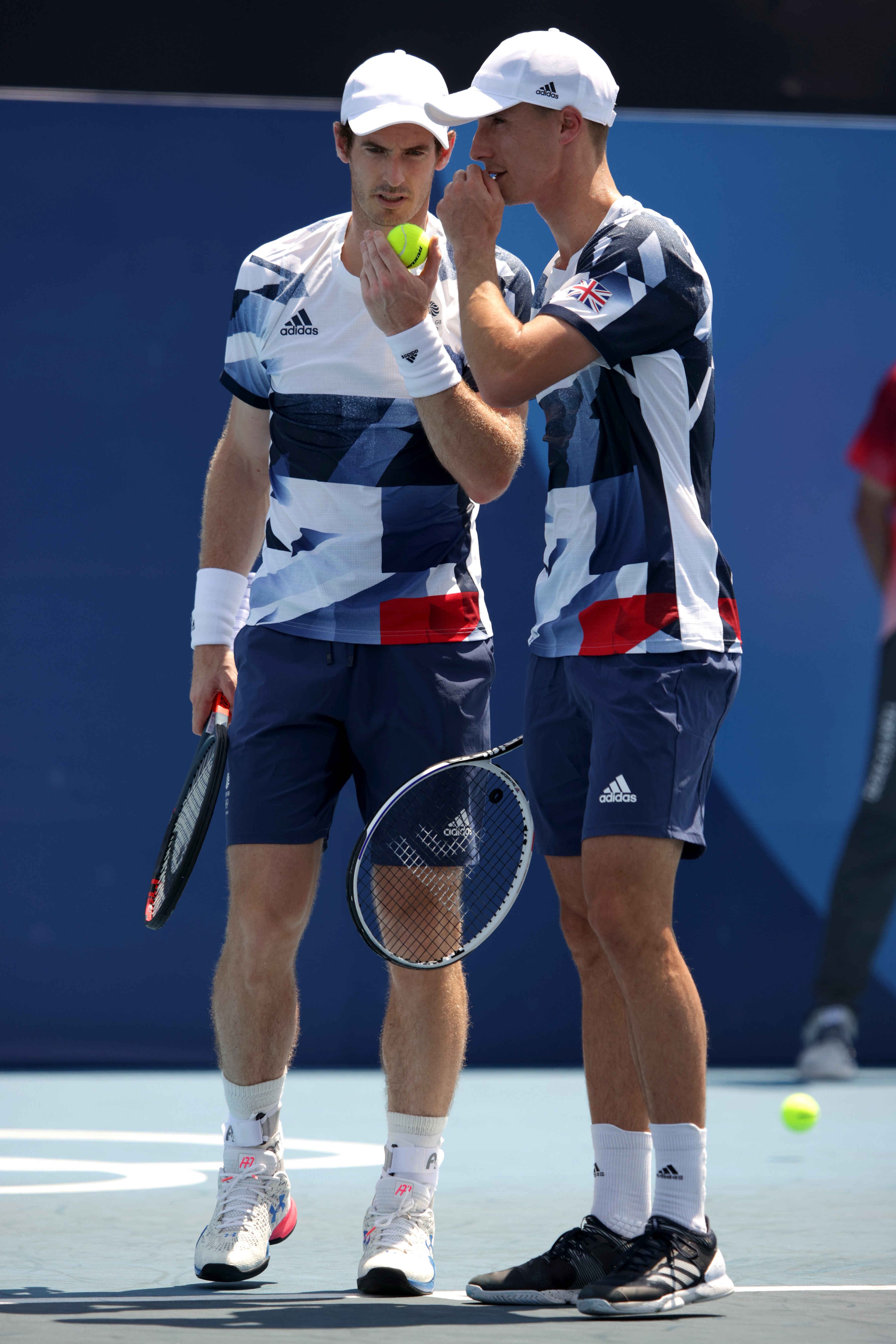 Andy Murray of Team Great Britain talks with his partner Joe Salisbury of Team Great Britain during their Men's Doubles First Round match against Nicolas Mahut of Team France and Pierre-Hugues Herbert of Team France on day one of the Tokyo 2020 Olympic Games at Ariake Tennis Park on 24 July 2021 in Tokyo, Japan