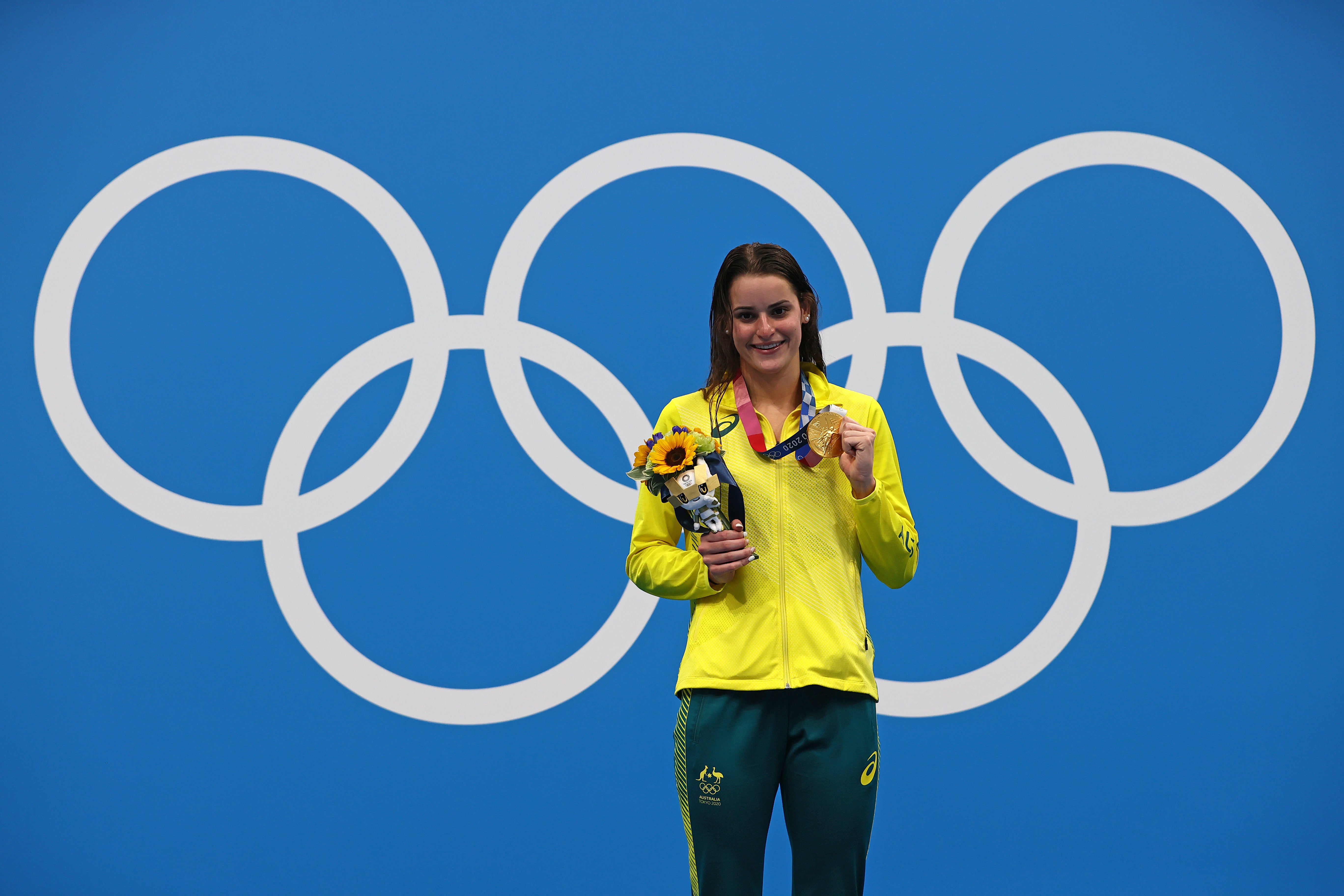 Kaylee McKeown of Team Australia poses with the gold medal after winning the Women's 100m Backstroke Final on day four of the Tokyo 2020 Olympic Games at Tokyo Aquatics Centre on 27 July 2021 in Tokyo, Japan