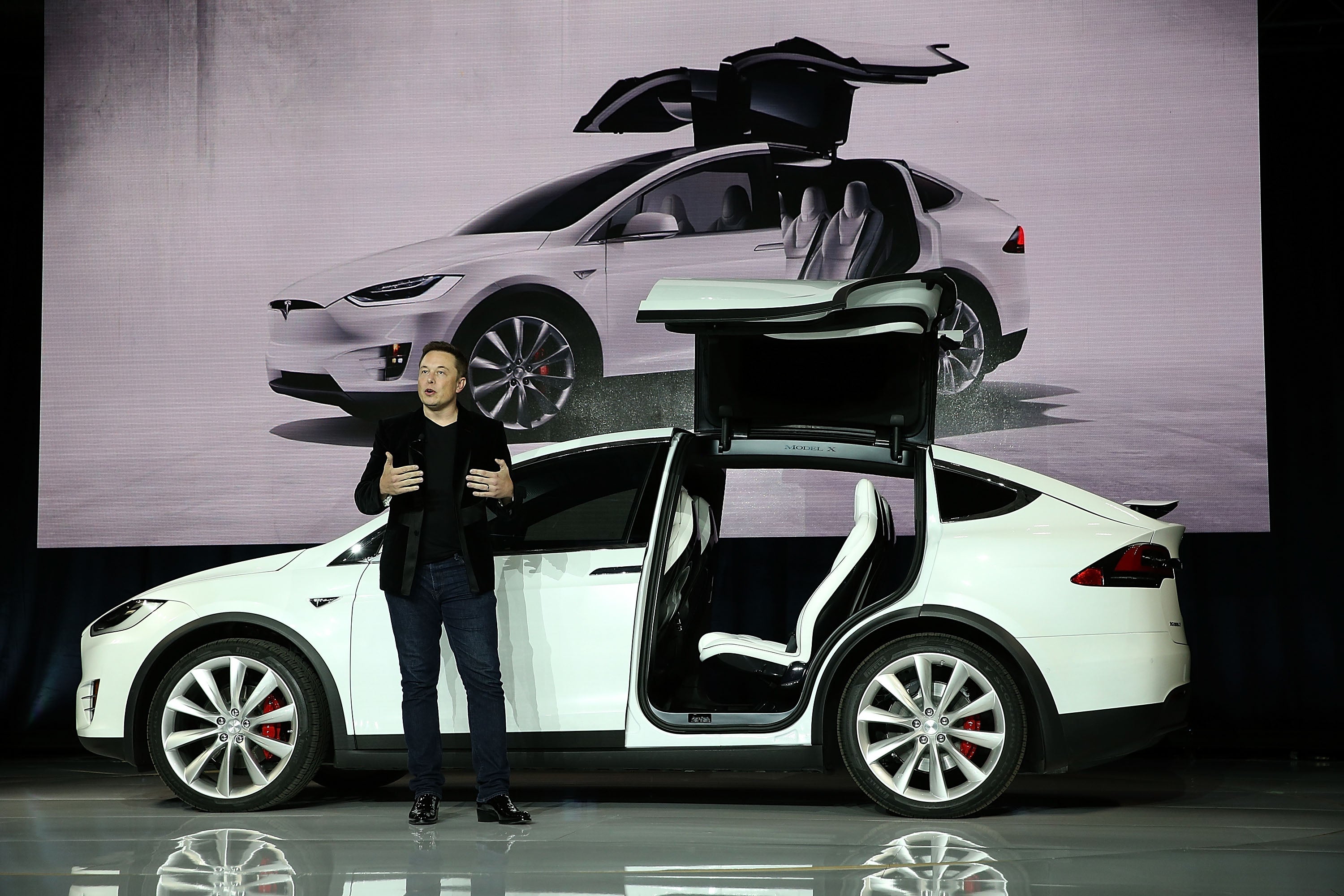 <p>Tesla CEO Elon Musk speaks during an event to launch the new Tesla Model X Crossover SUV </p>