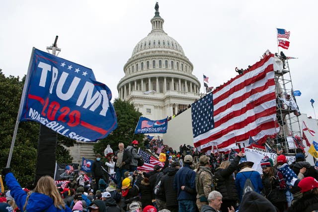 <p>Rioters loyal to then-President Donald Trump outside of U.S. Capitol on  Jan. 6, 2021, in Washington.</p>