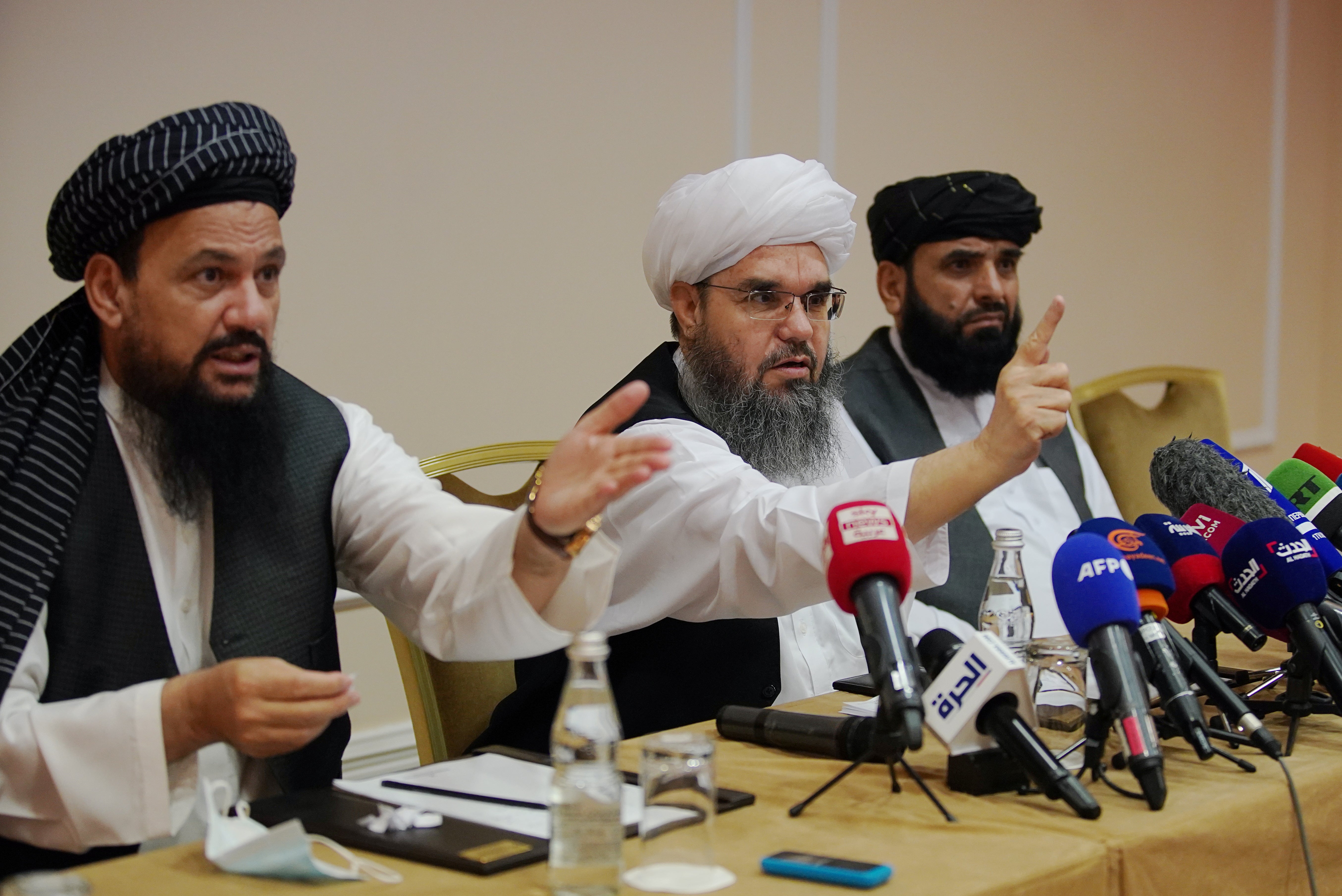 Members of Taliban political office attend a news conference in Moscow.