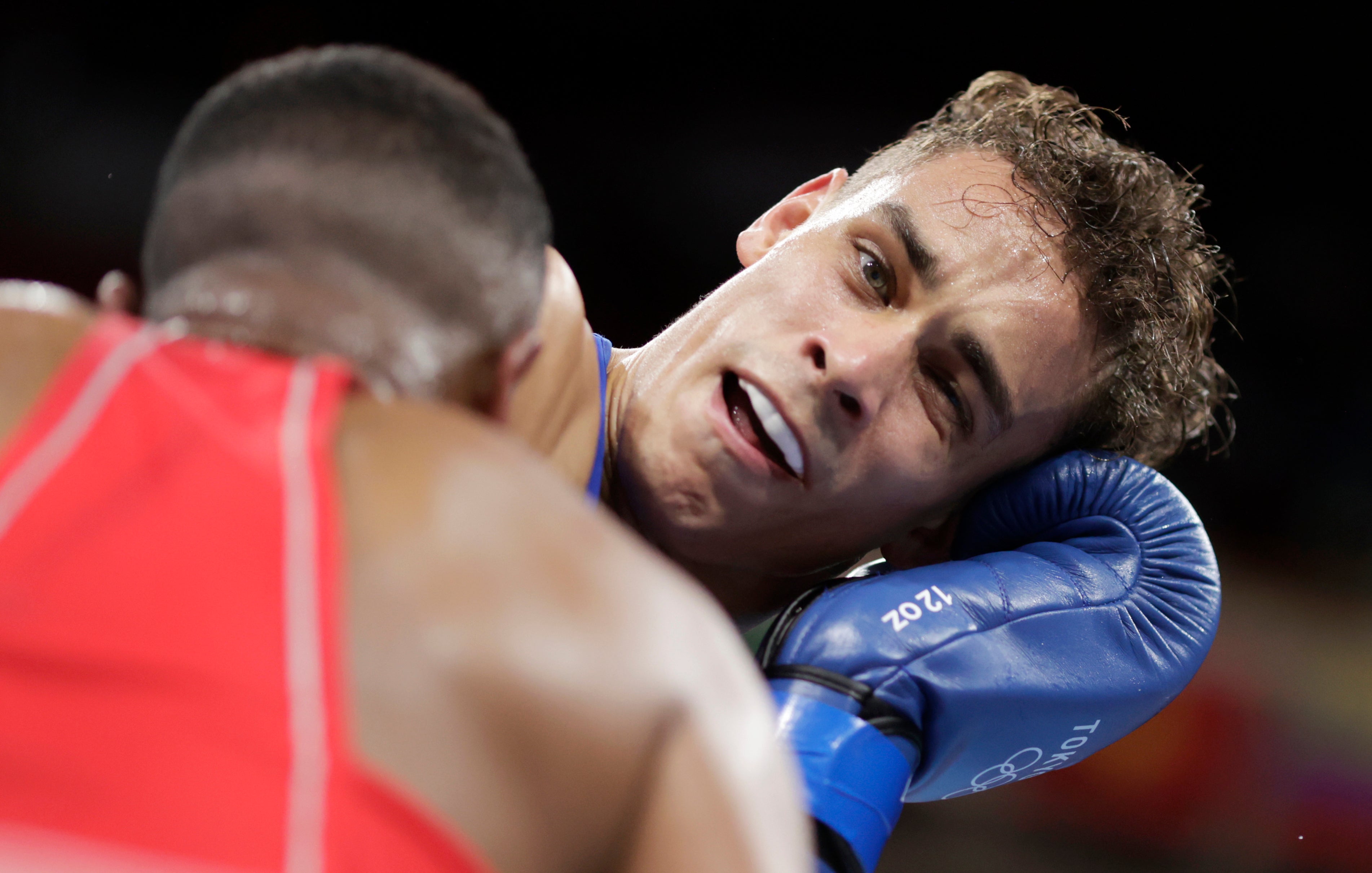 <p>Morocco’s Youness Baalla (red) tried to bite New Zealand’s David Nyika during their heavyweight bout at the Kokugikan Arena in Tokyo</p>