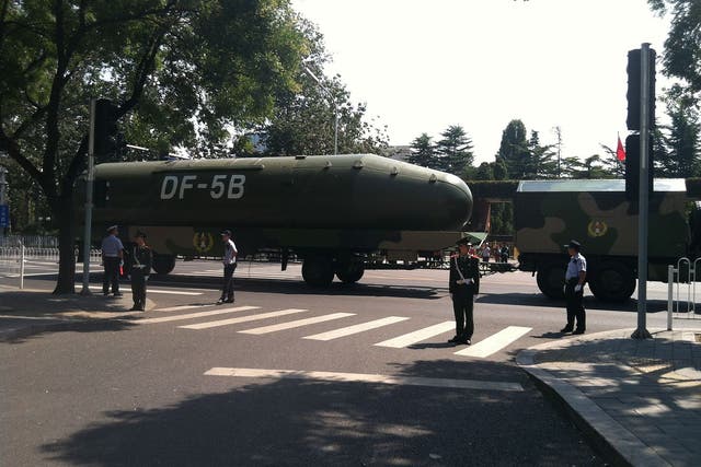 <p>The silos could hold long-range nuclear missiles like this DF-5B, shown at a Beijing military parade in 2015</p>