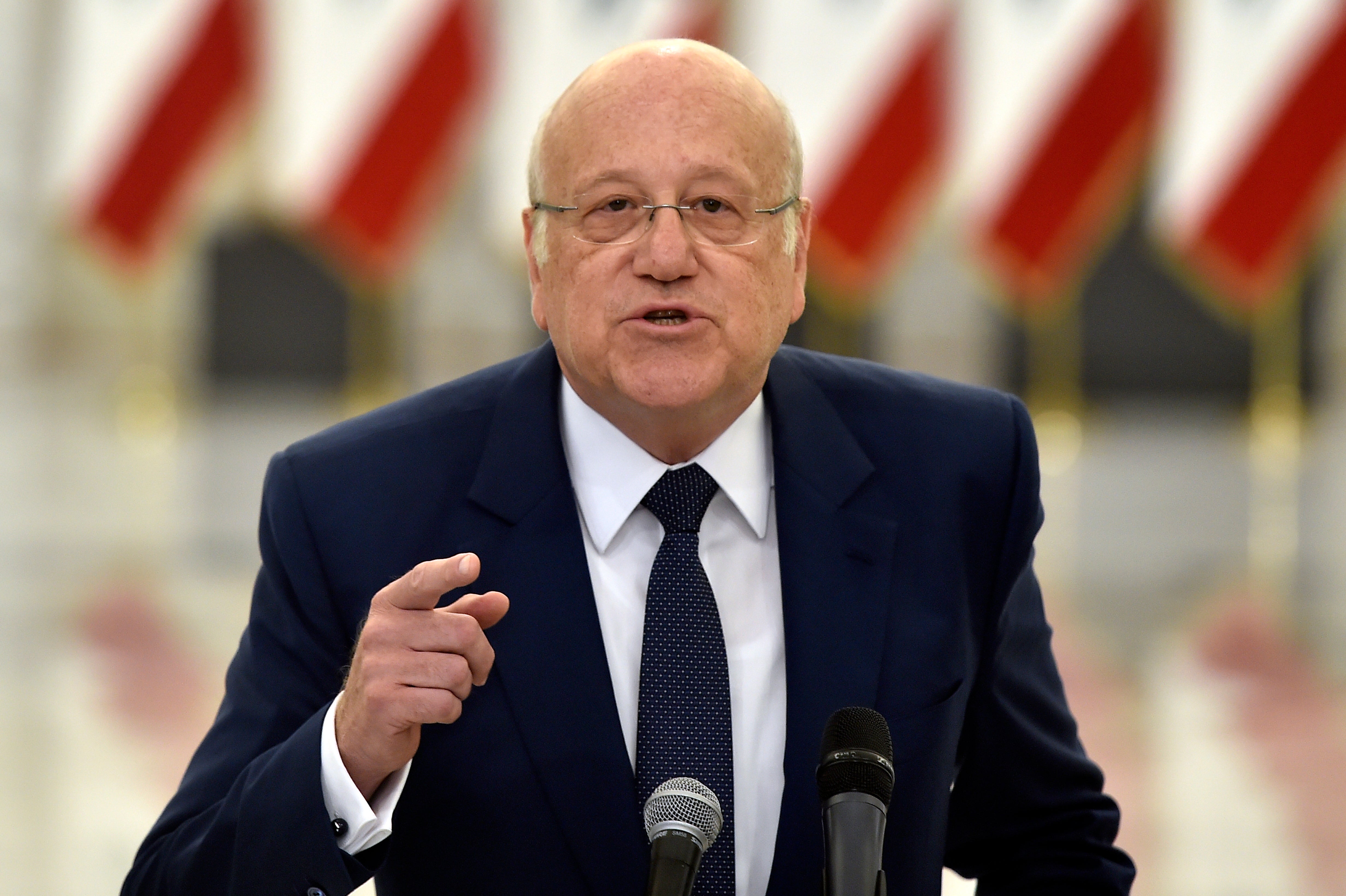 Prime Minister-designate Najib Mikati speaks to the media after his meeting with President Michel Aoun and assigned to form a new government