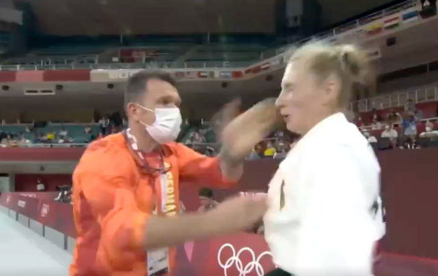 <p>German judoka shocks fans after her coach slaps her in pre-competition ritual </p>