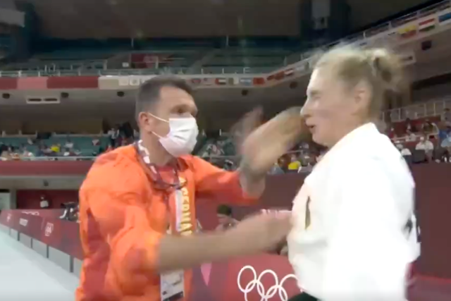 <p>German judoka shocks fans after her coach slaps her in pre-competition ritual </p>