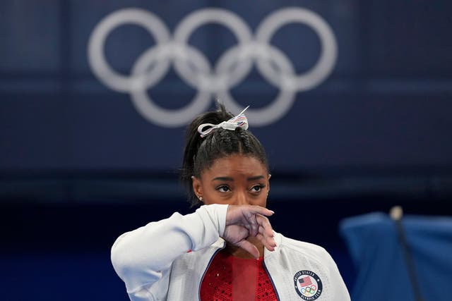 <p>Simone Biles watches gymnasts perform on Tuesday</p>