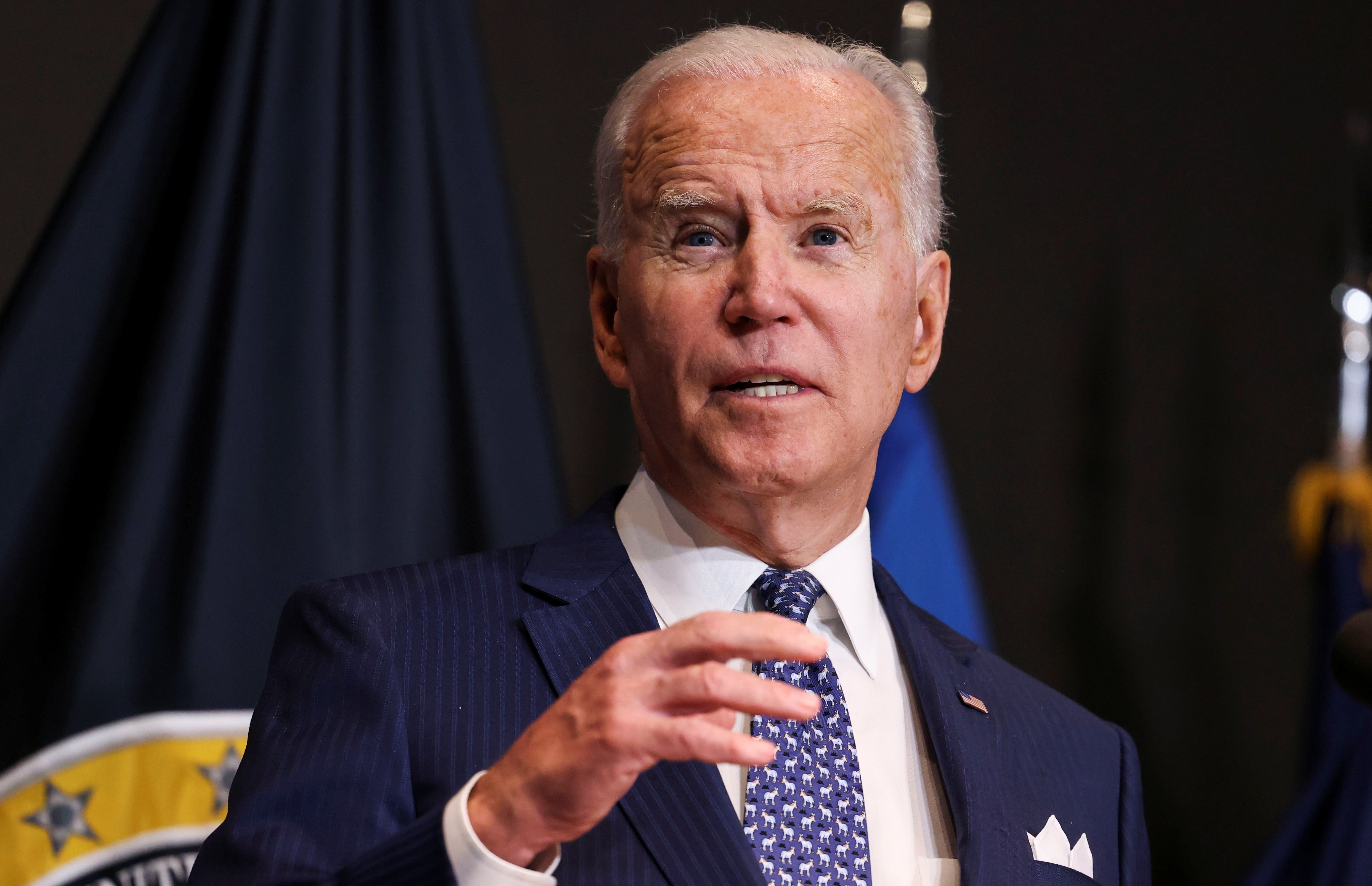 File: Joe Biden delivers remarks as he visits the Office of the Director of National Intelligence in McLean, Virginia on 27 July 2021