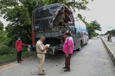 Truck hits laborers asleep on side of India road, killing 18