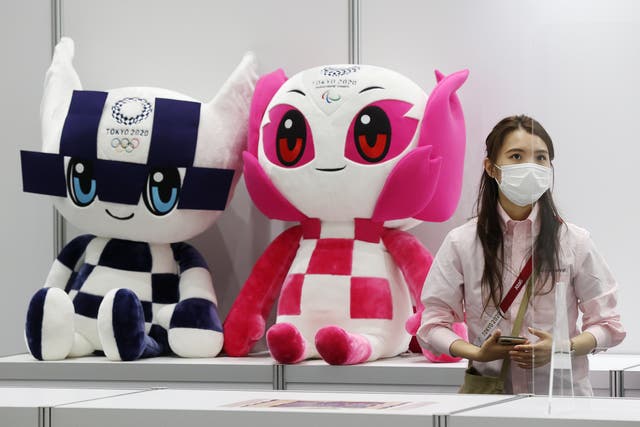 <p>Miraitowa and Someity, the mascots of the Olympic and Paralympic Games on display at the Main Press Centre of the 2020 Summer Olympics</p>