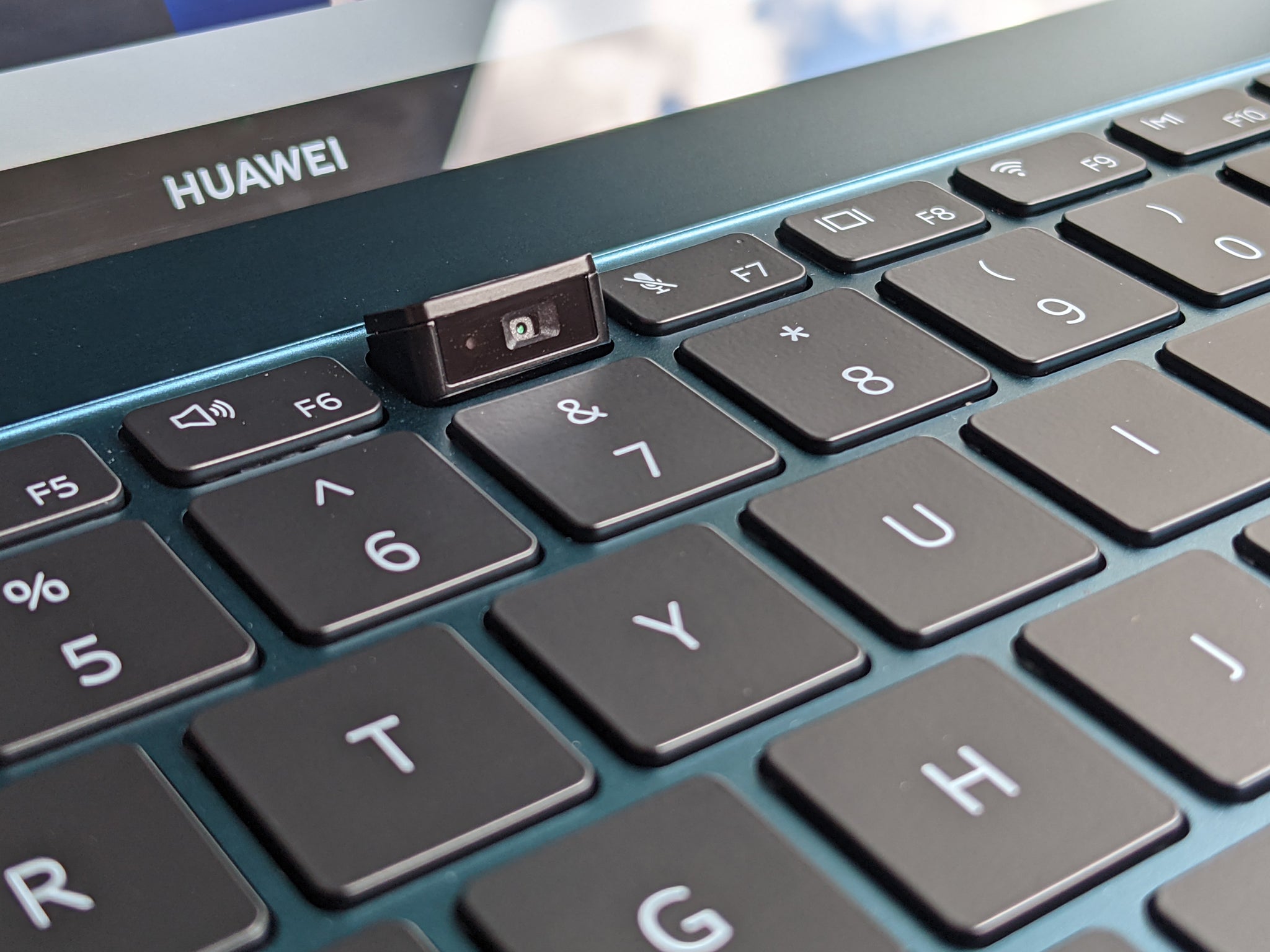 Huawei’s unfortunately positioned pop-up webcam hides beneath a fake key