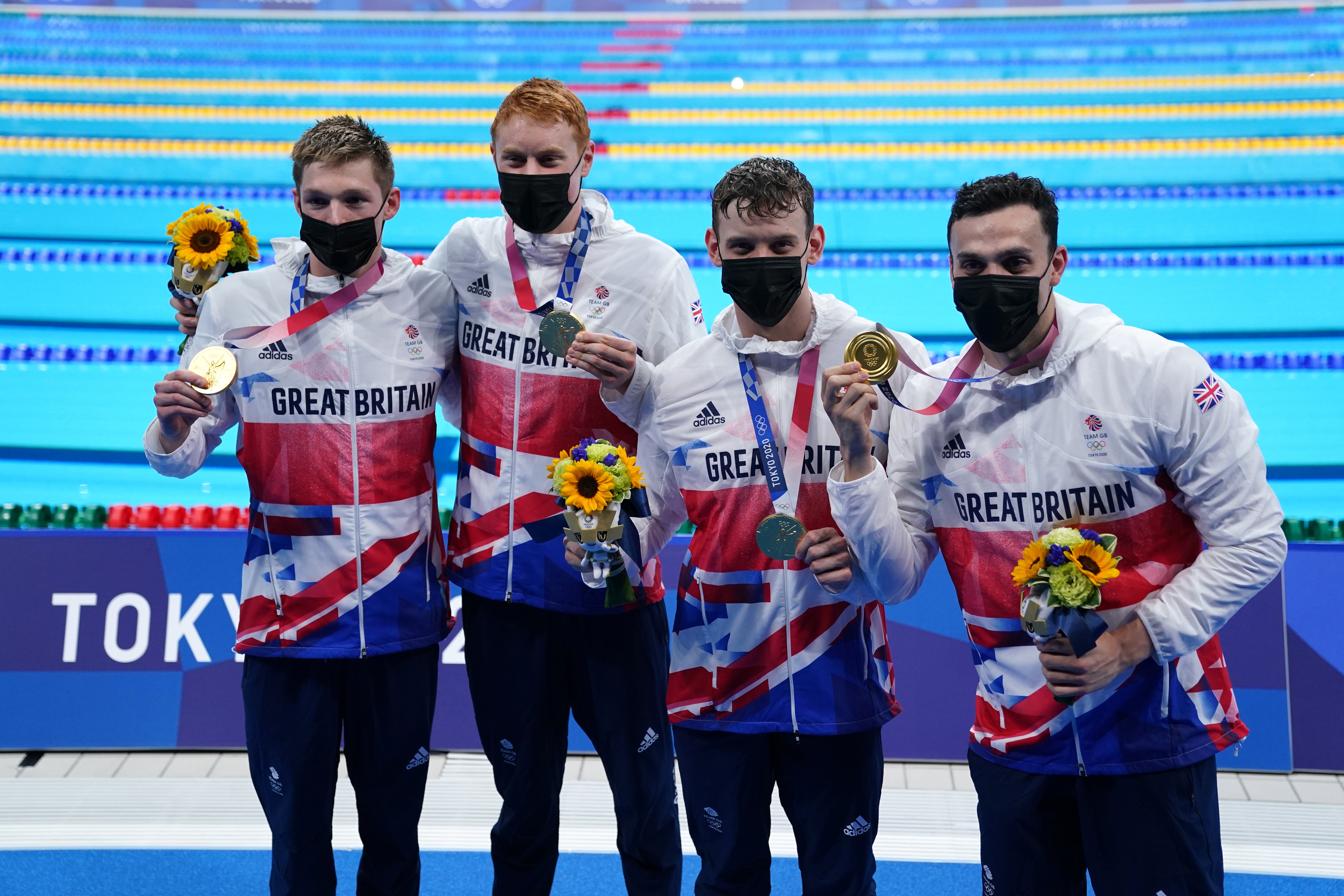 Duncan Scott, Tom Dean, Matthew Richards and James Guy after securing relay gold