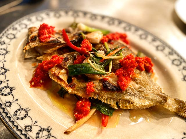 Whole grilled John Dory served Thai-style, in as un-Thai a setting as you can imagine