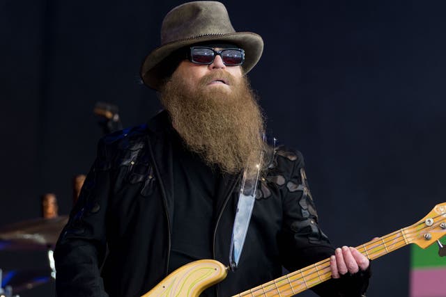 <p>Dusty Hill performs on the Pyramid Stage during the 2016 Glastonbury Festival</p>