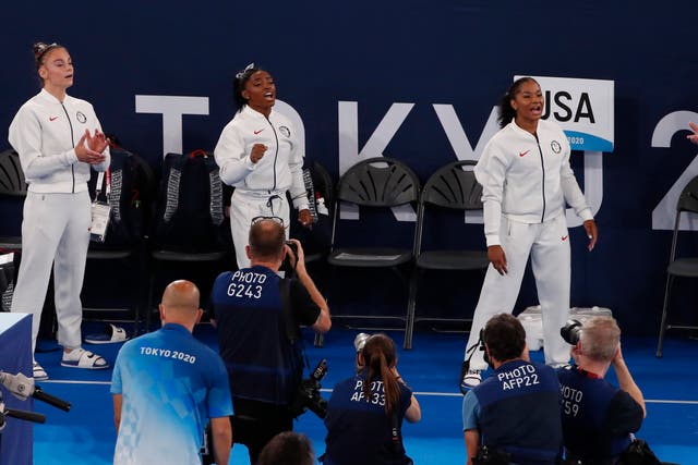 <p>Athletes from the USA support their teammate Simon Biles during the Artistic Gymnastics Women Final of the Tokyo 2020 Olympic Games at the Ariake? Gymnastics Centre in Tokyo, Japan, 27 July 2021</p>