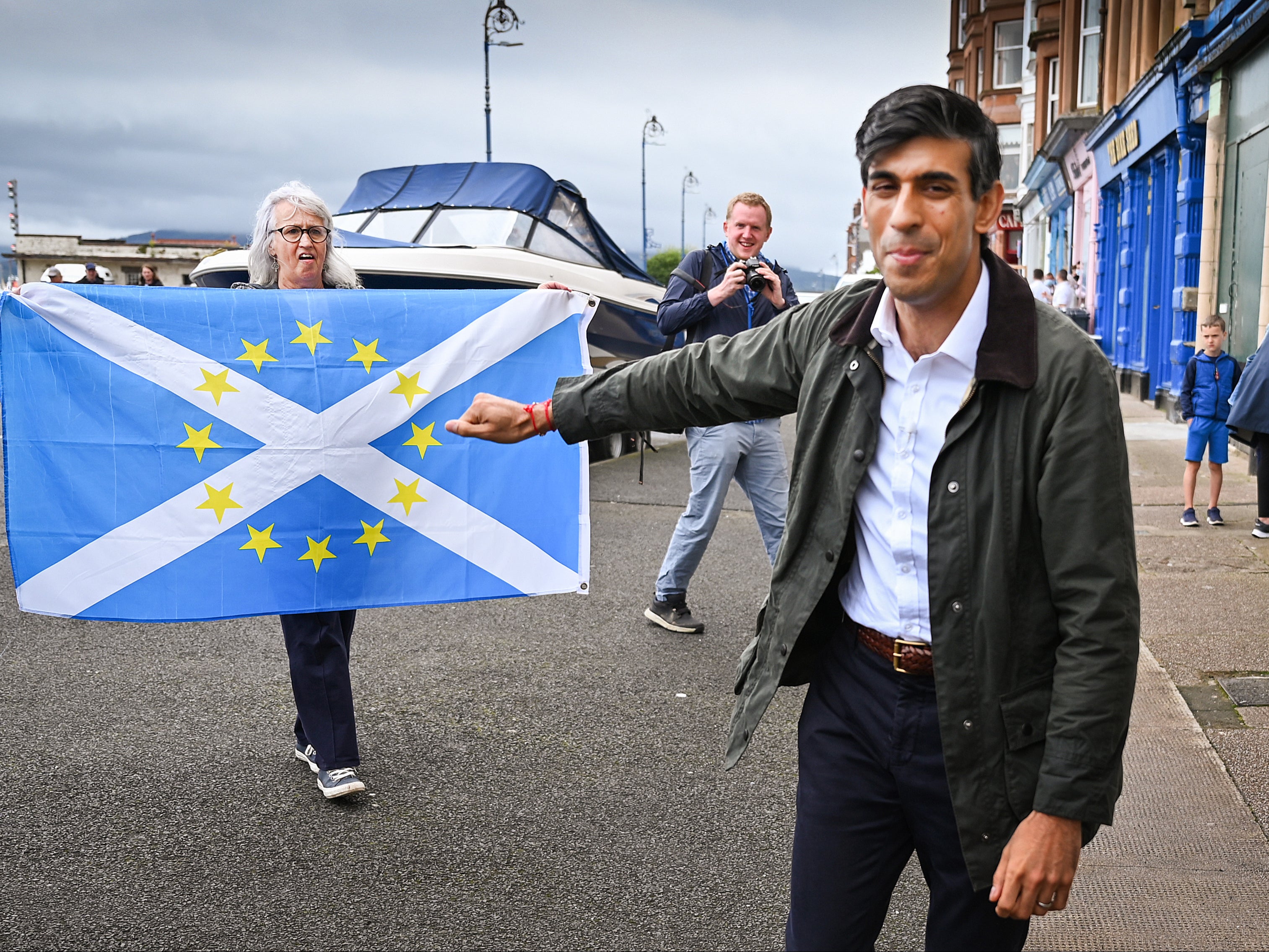 In this file photo from 2020, Sunak is greeted by nationalist demonstrators during a visit to the Isle of Bute