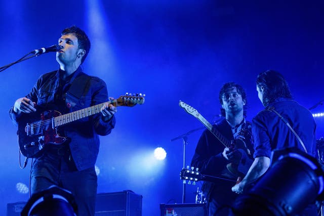 <p>The Maccabees’ Orlando Weeks, Felix White and Hugo White at their farewell show at Alexandra Palace, London, in 2017</p>
