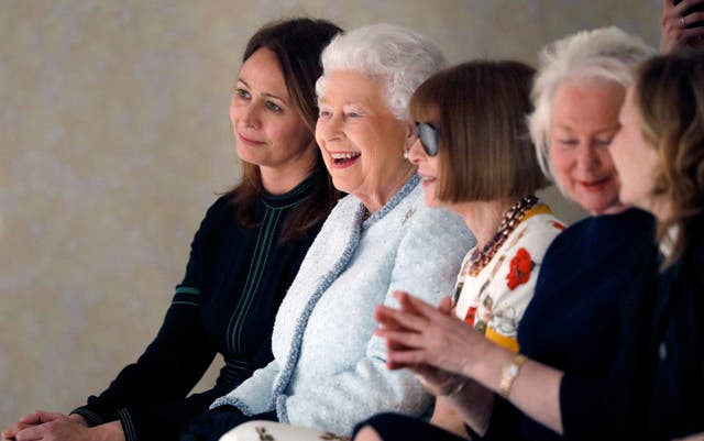 <p>Rush (L) with the Queen and Anna Wintour: ‘The aim is to really lift up the women’</p>