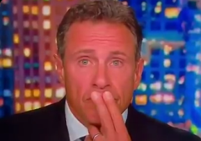 CNN anchor Chris Cuomo listens as a guest tries to explain why they only accept unvaccinated people into their restaurant.