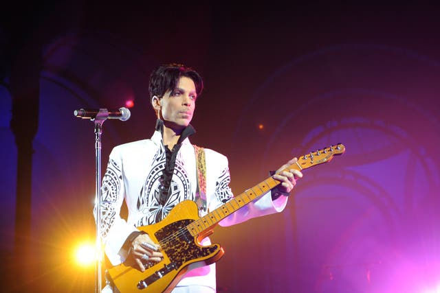 <p>Prince performing in 2011</p>