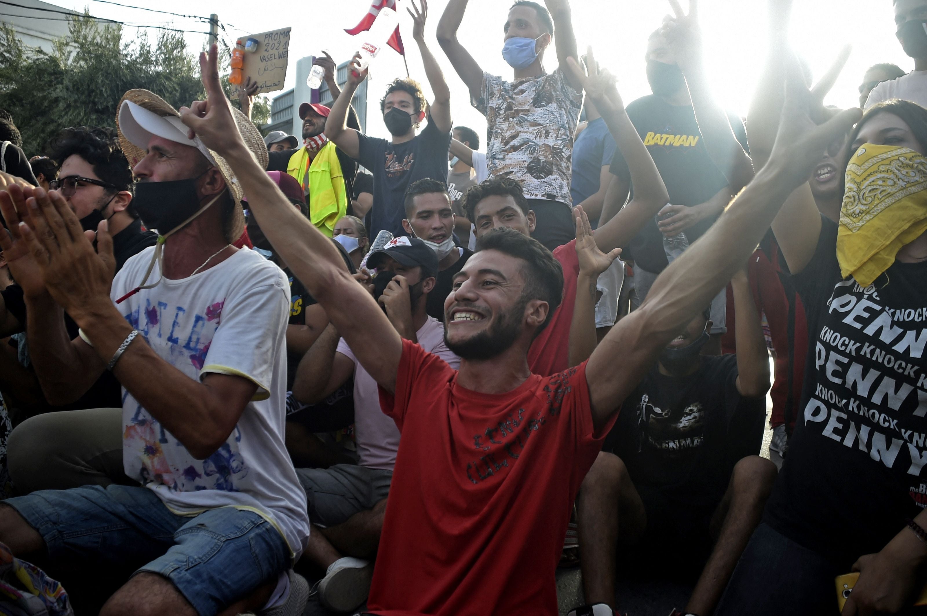 <p>Supporters cheer outside parliament in Tunis after the president dismissed the prime minister </p>