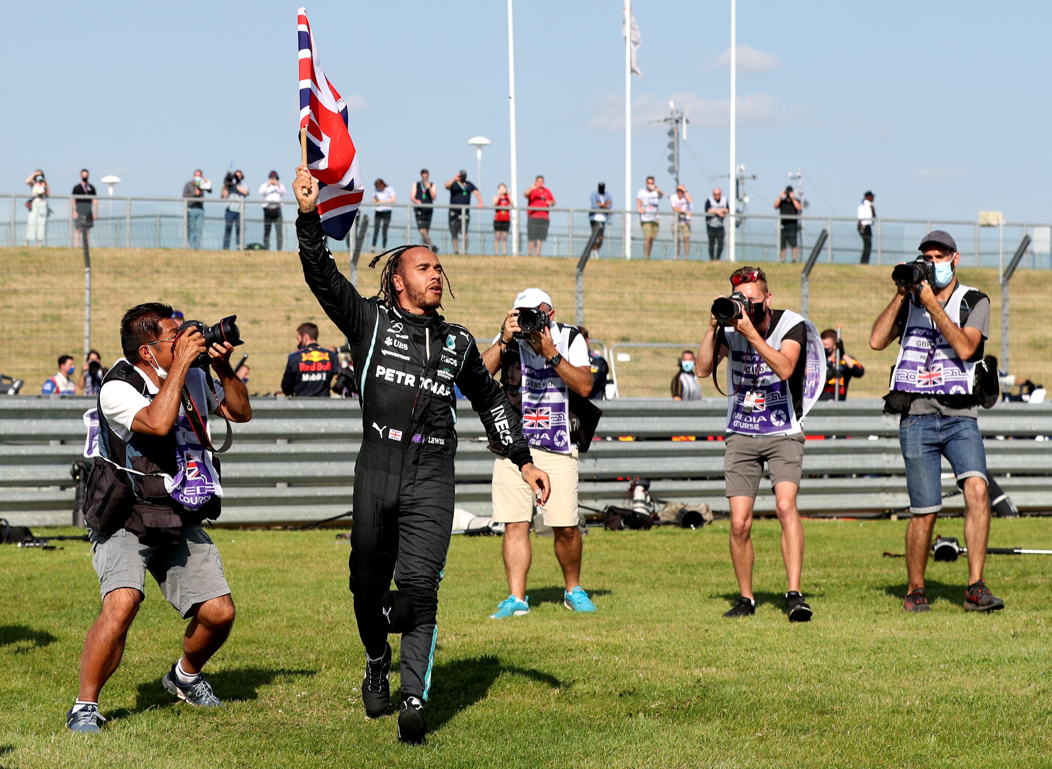 Lewis Hamilton celebrates after winning the British Grand Prix (Bradley Collyer/PA)