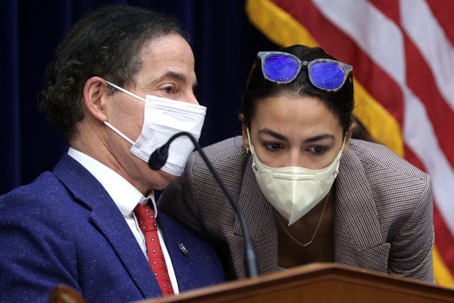 <p>Subcommittee Chairman Rep. Jamie Raskin (D-MD) (L) listens to Rep. Alexandria Ocasio-Cortez (D-NY) during a hearing. </p>