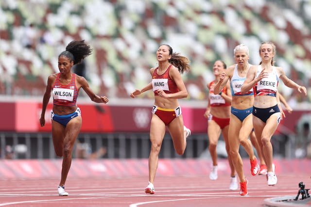 <p>File: Ajee Wilson of Team United States and Chunyu Wang of Team China compete during the Women's 800m heats  at the Tokyo 2020 Olympic Games</p>