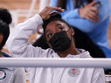 Simone Biles posts video showing her landing on her back during training as she struggles with ‘twisties’