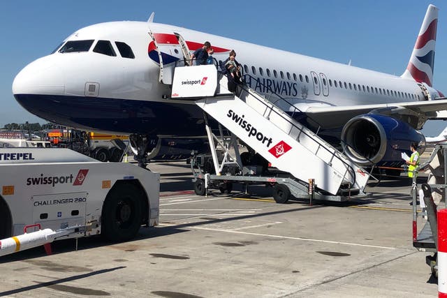 <p>Half full: British Airways Airbus A320 at Dublin airport. The IAG group filled 49.2% of seats in the first half of 2021</p>