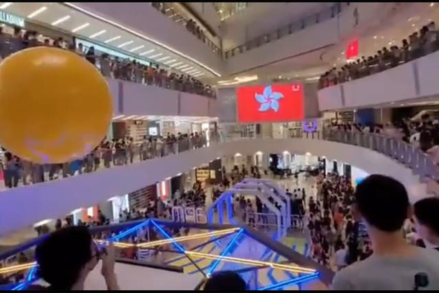 <p>Crowd at Hong Kong mall boo Chinese national anthem during a broadcast of the medal ceremony as a Hong Kong fencer was awarded</p>
