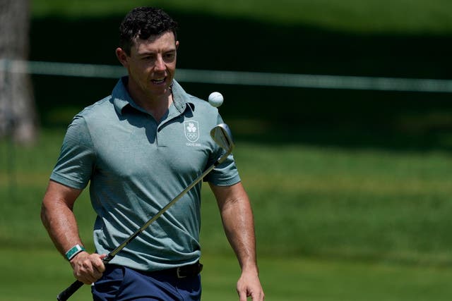 Rory McIlroy is in medal contention in Tokyo (Matt York/AP)