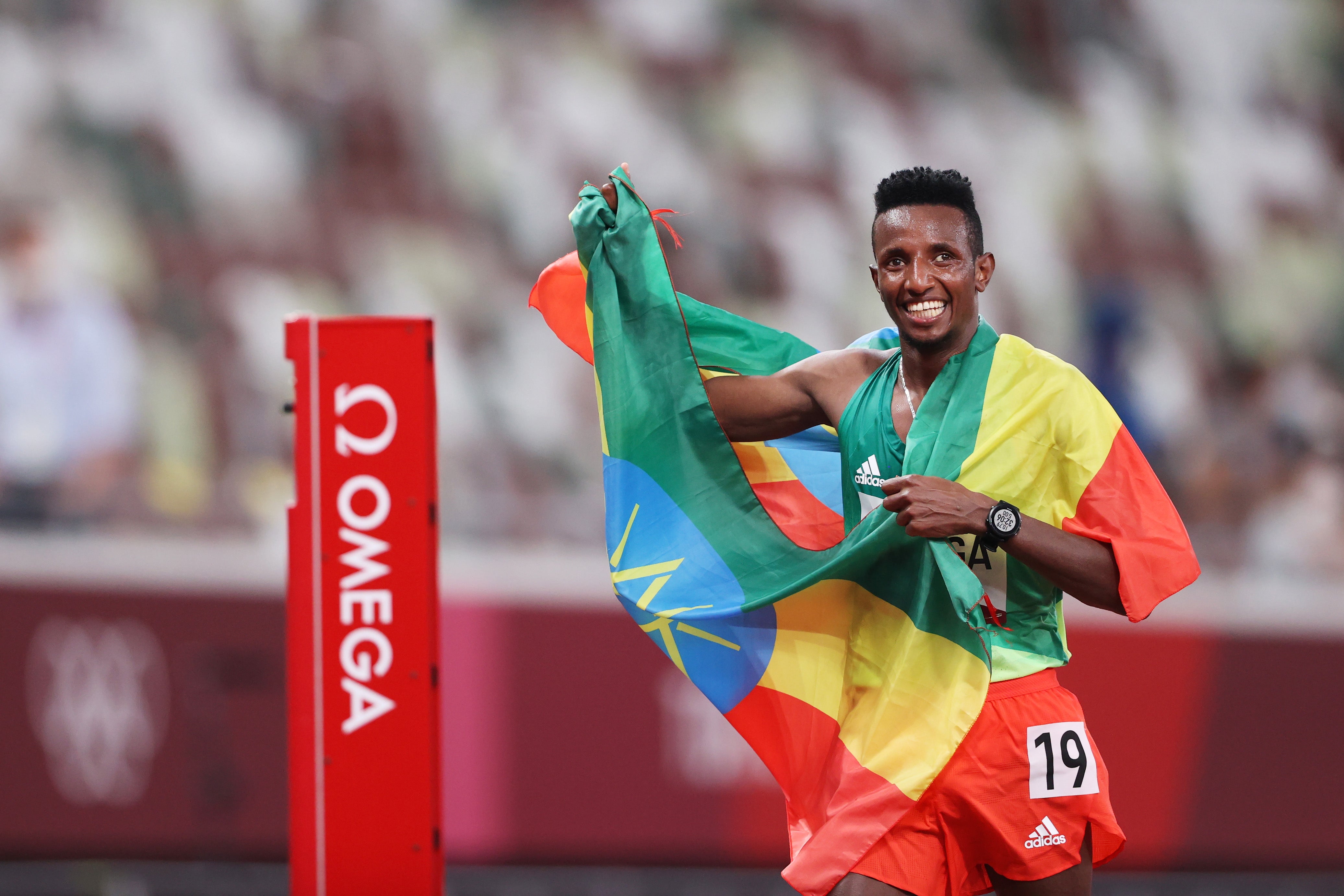 Selemon Barega of Team Ethiopia celebrates his win