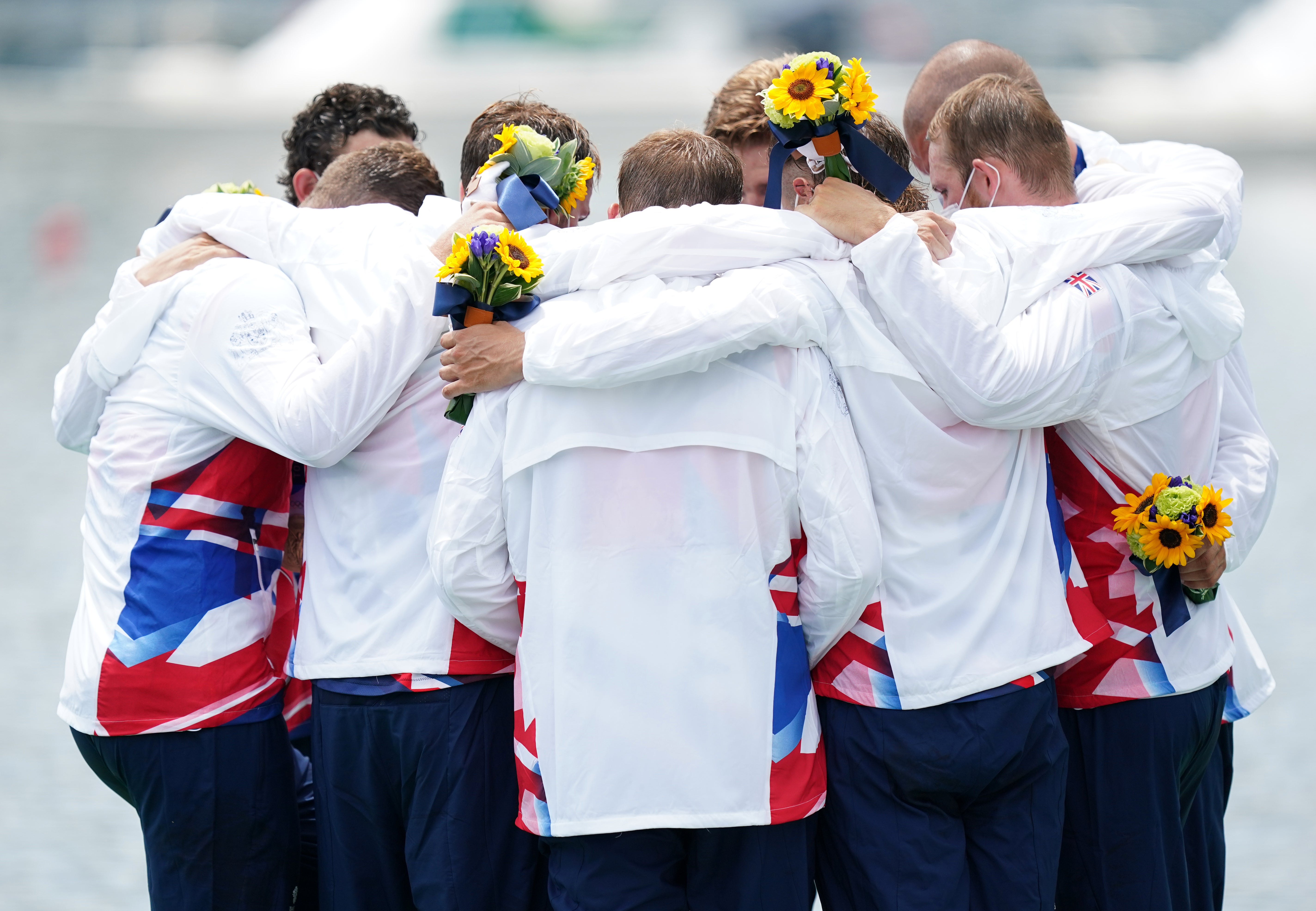 Great Britain men’s eight celebrate on the podium (Mike Egerton/PA)