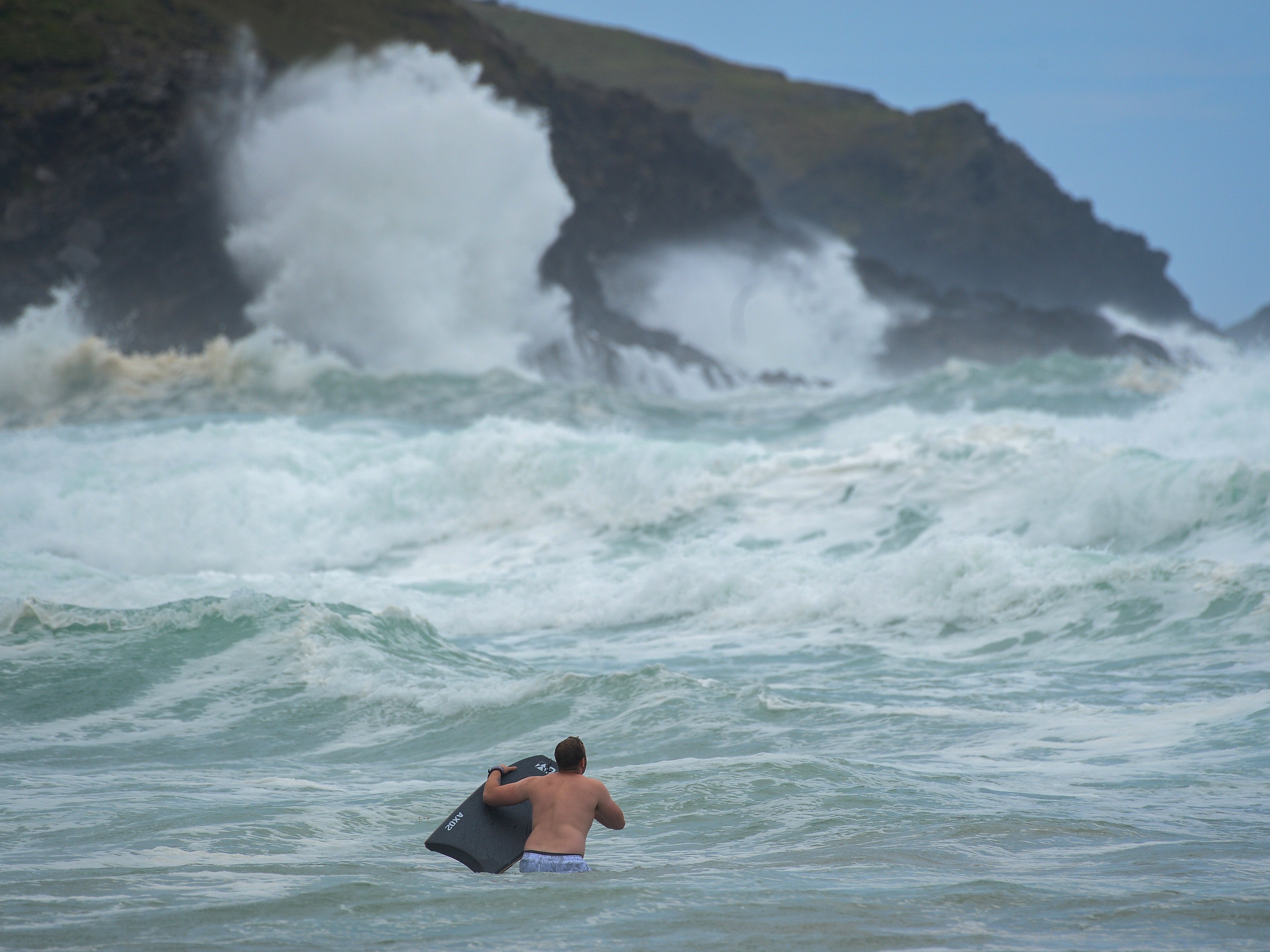 Bodyboarders brave the waves in rough seas at Fistral beach on 30 July 2021 in Newquay, United Kingdom. Storm Evert is the UK’s fourth named storm since October 2020