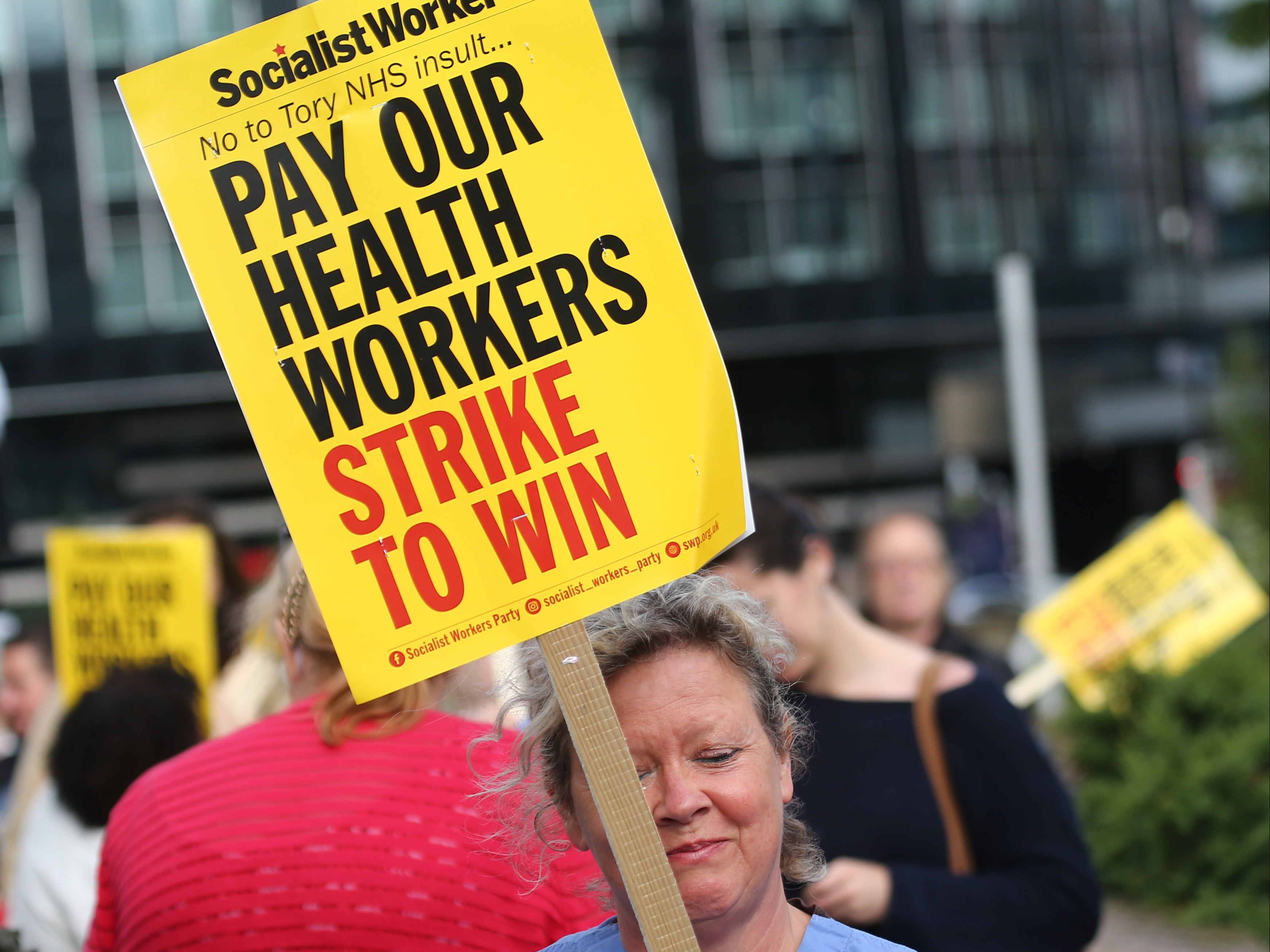 NHS workers demonstrate, demanding pay rise and better working conditions in London.
